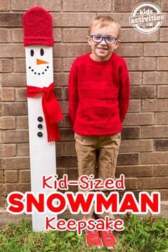 a young boy standing next to a snowman made out of wood with the words kid sized snowman keeps his feet warm