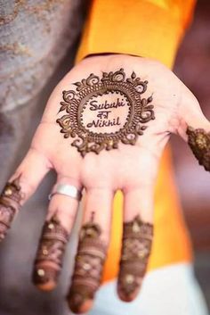 a woman's hand with henna on it and the words sulah at nihil