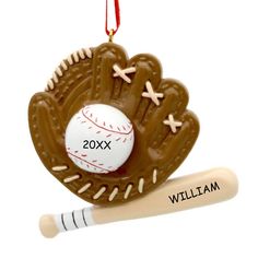 a baseball ornament with a glove and ball