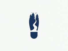 a logo for a travel company with mountains and trees in the background on a white background