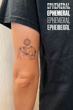 a person with a tattoo on their arm that says ephemeral ephemeral ephemeral ephemeral