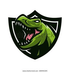 an alligator head with open mouth and sharp teeth in the middle of a shield logo