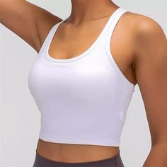 White Racerback Croptop Workout Top Also Available In Blue, Black And Pink. The Item Is Brand New, Never Worn And Comes In Original Clear Packaging. Shop With Confidence - 100+ Positive Reviews! Casual Crop Top With Light Support For Exercise, Medium Support Scoop Neck Crop Top For Sports, Casual Scoop Neck Sports Bra For Workout, Casual Sports Bra For Light Sports With Built-in Bra, Casual Sports Bra With Built-in Bra For Light Sports, Basic White Sports Crop Top, Basic White Crop Top For Sports, Casual Moisture-wicking Crop Top For Light Sports, White Sporty Tank Sports Bra