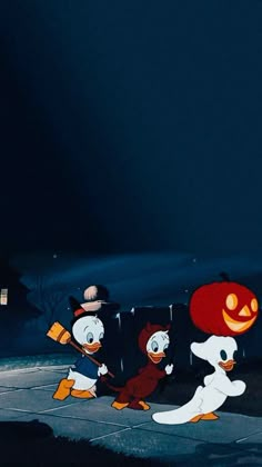 three cartoon characters dressed in halloween costumes