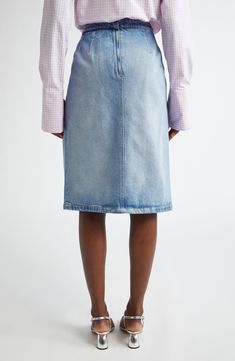 A faux-wrap silhouette and gathered waist add dimension to a light-wash denim skirt that brings retro coolness to your ensembles. 25 1/2" length (size 38 FR) Back zip closure 100% cotton Machine wash, dry flat Made in Italy Designer Clothing Classic Blue Denim Skirt For Spring, Classic Blue Denim Skirt For Summer, Classic Medium Wash Denim Skirt For Spring, Fitted Washed Blue Denim Skirt For Spring, Classic Blue Denim Summer Skirt, Classic High Waist Denim Skirt For Spring, Classic High-waist Denim Skirt For Spring, Fitted Washed Blue Denim Skirt, Relaxed Light Wash Denim Skirt