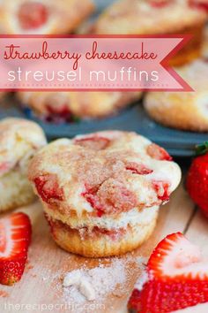 strawberry cheesecake strussel muffins with powdered sugar and fresh strawberries