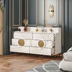 a white and gold dresser in a room