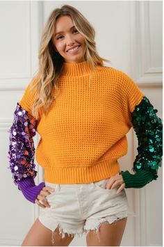 Mardi Gras sequin sleeve top . This sequin patch top will have you so cute for all of the parades y’all!  Oversized fit  💜💚 💛THIS PREORDER SHIPS MID December    📌  𝗧𝗛𝗘𝗥𝗘  𝗔𝗥𝗘  𝗡𝗢  𝗖𝗔𝗡𝗖𝗘𝗟𝗟𝗔𝗧𝗜𝗢𝗡𝗦   𝗢𝗡   𝗣𝗥𝗘𝗢𝗥𝗗𝗘𝗥  𝗜𝗧𝗘𝗠𝗦 ! 𝗪𝗲  𝗽𝘂𝗿𝗰𝗵𝗮𝘀𝗲  𝘁𝗵𝗲𝘀𝗲   𝗶𝘁𝗲m𝘀  𝗳𝗿𝗼𝗺  𝗼𝘂𝗿  𝗩𝗲𝗻𝗱𝗼𝗿  𝘄𝗵𝗲𝗻  𝘆𝗼𝘂𝗿   𝗼𝗿𝗱𝗲𝗿  𝗶𝘀   𝗽𝗹𝗮𝗰𝗲𝗱 . Mardi Gras Dress, Bride Birthday, Patch Top, Mardi Gras Parade, Sequin Patch, Sequin Sleeve, Sweater Hat, New Years Dress, Color Block Sweater