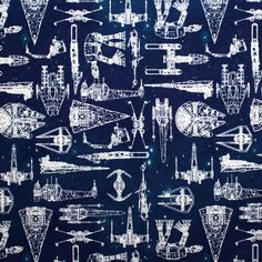 a blue background with white airplanes and ships on it's side, as well as a ruler