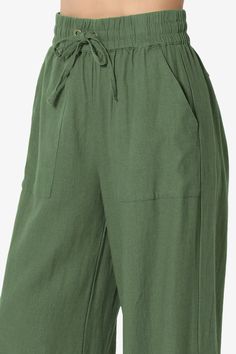 Essential pants for kicked-back days in the sun are cut from cool, crisp linen with a drawstring waist to make them extra comfortable and easy to fit. Wear yours with a tucked-in blouse and sandals.Lightweight woven linen blend, High riseElasticized drawstring waist, Slant front pockets, Faux welt back pockets with buttonRelaxed fit, Wide leg, Pull-on style, 28in inseamFits true to US size, take your normal size(S=2-4)Model size : 5'3" height, 34" bust, 24" waist, 34" hip, and is wearing a size Casual Linen Harem Pants For Vacation, Solid Wide Leg Beach Pants With Drawstring, Solid Ankle-length Harem Pants With Drawstring, Solid Ankle-length Drawstring Harem Pants, Solid Color Vacation Harem Pants With Pockets, Green Linen Beach Pants, Green Bottoms With Tie Waist For Loungewear, Green Loungewear Bottoms With Tie Waist, Casual Solid Color Harem Pants For Vacation