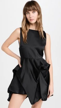 Summer Evening Peplum Mini Dress, Spring Evening Peplum Mini Dress, Staud Landry Dress, Luxury Ruffled Peplum Dress, Stretch Satin Fabric, Feminine V-neck Peplum Top, Black Sheer Dress, Draped Skirt, Designer Drapes