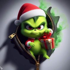 the grinch is holding a christmas present in his hand