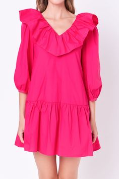 This sweet and chic ruffled mini is perfect for dressing up or dressing down. With a flattering v-neckline and delicate ruffle detail, this mini is perfect for showing off your curves. Made with a soft and lightweight fabric, it's perfect for layering. Dress it up with heels or dress it down with sandals - either way, you're sure to fall in love with our ruffled mini. V neckline Ruffle detail 3/4 puff sleeve Mini length Lining Hand wash cold Do not bleach Do not tumble dry Iron low Shell: 100% Cotton Lining: 80% Polyester 20% Cotton HN1196D Total length :33.75" Bust :36.5" S Height 5'9"/(175cm) / Bust 30"/(76.5cm) / Waist 24.5"(62cm) / Hip 34"(86cm) Spring Tiered V-neck Dress With Ruffles, Spring V-neck Dress With Ruffles For Date Night, Chic V-neck Dress With Ruffle Hem For Day Out, Pink V-neck Mini Dress With Ruffle Hem, Feminine V-neck Ruffle Dress With Ruffle Hem, Chic Pink V-neck Ruffle Dress, Spring V-neck Dress With Ruffle Sleeves, Feminine Spring V-neck Dress With Ruffles, Flirty Ruffle Sleeve Mini Dress