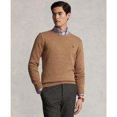 Stay cozy this season in Polo Ralph Lauren's timeless cotton crewneck sweater. Soft, breathable cotton lets your style shine through even on cooler days. Updated regular fit falls wider at the chest while still fitting your form. Signature embroidered Pony at the chest adds instant preppy flair. At just 27' long in the medium, it pairs perfectly with your favorite jeans or chinos. Quality cotton, classic fit, and ease of machine wash care - what more could you ask from a go-to layer? Human: Here Ralph Lauren Sweater With Ribbed Cuffs For Fall, Ralph Lauren Fall Sweater With Ribbed Cuffs, Classic Brown Polo Sweater With Crew Neck, Classic Brown Crew Neck Polo Sweater, Ralph Lauren Casual Fall Sweater, Casual Brown Crew Neck Polo Sweater, Ralph Lauren Fitted Casual Sweater, Ralph Lauren Long Sleeve Winter Sweater, Classic Brown Sweatshirt