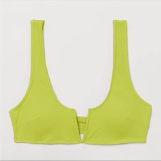 H&M Bikini Top. Color: Lime Green Size: 8. This Bikini Top Has No Matching Bottoms. Purchased From H&M. Reasonable Offers Welcomed. Other Ways To Pay Accepted. Smoke Free & Pet Free Household. Summer Low-cut Swimwear With Built-in Bra, Summer Low-cut Seamless Swimwear, Summer Seamless Low-cut Swimwear, H&m Summer Beach Tops, Seamless Low-cut Summer Swimwear, Summer Swimwear With Built-in Bra, Low-cut, Low-cut Beachwear Swimwear For Spring, Spring Low-cut Beachwear Swimwear, Green Sleeveless Bra-friendly Swimwear