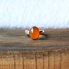 Natural carnelian ring Bold Sterling Silver Statement ring | Etsy Modern Orange Gemstone Rings, Modern Orange Oval Rings, Orange Gemstone Promise Ring, Handmade Amber Promise Rings, Unique Orange Cabochon Ring, Oval Cabochon Solitaire Ring For Gift, Oval Cabochon Solitaire Ring As Gift, Minimalist Cabochon Rings For Gifting, Solitaire Oval Cabochon Ring For Gift