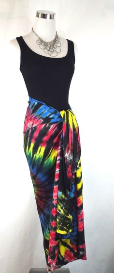 44'X72"  (112cmx183cm) Black backed Sarong with Red, Blue and Yellow swirl. Made in Bali. Hemmed on four edges with cotton thread to avoid a "saddle stitched" effect when dyed. Like all  rayon fabric, they take dyes exceptionally well.  Can be worn as sarong, skirt, dress or vest. Made to Order yours will be similar to the one in the photo, please remember to enjoy an artists hand as no two spirals will ever be quite the same.The dyes I use bond with the fabric, so the colors won't fade or wash Swirl Tie Dye, Sarong Skirt, Blanket Bed, Bed Throw, Beach Wrap, Lap Blanket, Bright Colored, Bed Throws, Sarong