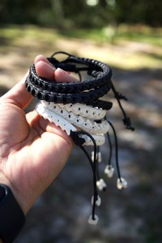 The Nagini Bangle: Real Black Snake Vertebrae Bracelet, Adjustable Bracelet / Snake Spine Bracelet, Bone Beads / Fair Trade Oh, these are the coolest beads ever! This bracelet is made from real Snake Vertebrae Bone Beads that have been dyed to a beautiful dark brown-black color. The single vertebrae bone beads interlocks and give the bracelet a real look at how the bones are locked in the animal's body. The bracelet is approximately 10 inches of beads and a sliding knot that will make it longer, Snake Bone Jewelry, Snake Vertebrae Jewelry, Handmade Adjustable White Leather Bracelet, White Handmade Adjustable Leather Bracelet, Handmade White Leather Adjustable Bracelet, Adjustable Handmade White Leather Bracelet, Snake Vertebrae, Bone Bracelet, Mermaid Bag