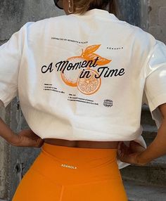 A Moment In Time T shirt Easy 30 day return policy Athleisure T-shirt With Letter Print, Summer Athleisure Tops With Graphic Print, Athleisure Graphic Print T-shirt For Everyday, Everyday Athleisure Graphic T-shirt, Summer Relaxed Fit Shirt With Logo Print, Spring Athleisure Letter Print T-shirt, Spring Letter Print Athleisure T-shirt, Everyday Athleisure Tops With Letter Print, Orange Letter Print T-shirt For Spring