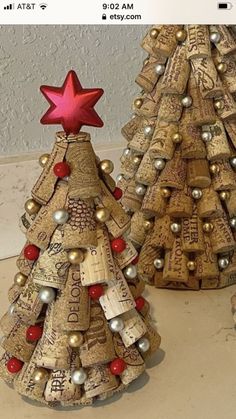 two christmas trees made out of wine corks