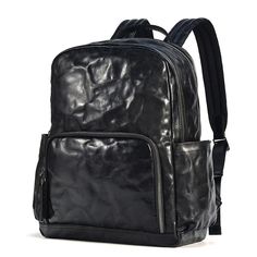 Whether you're on your way to the office, participating in business meetings, or setting off for a weekend getaway, this leather backpack serves as the ideal companion for the modern man on the move. Its versatile design seamlessly transitions between professional settings and casual outings, ensuring that you make a stylish statement wherever you go. The leather construction not only adds a touch of sophistication but also guarantees durability for your on-the-go lifestyle. Equipped with ample storage space, it accommodates your work essentials during weekdays and seamlessly transitions to a reliable travel companion for your weekend escapades. The thoughtfully crafted details and modern aesthetic make it a go-to accessory, effortlessly blending functionality with a refined sense of style Modern Faux Leather Backpack For Travel, Large Capacity Leather Business Backpack, Modern Faux Leather Backpack, Black Leather Backpack For Business Trips, Business Backpack In Soft Leather, Functional Leather Backpack For Business, Modern Faux Leather Backpack For School, Leather Laptop Bag With Large Capacity, Modern Faux Leather School Backpack