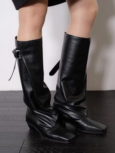 Editor's NotesThese chic boots are perfect to wear for an elevated and eccentric look- Knee-high boots- Slouchy relaxed look- Adjustable buckle and strap - Slight heel- Square toeMeasurements(in.)- Size: KR 225mm- KR 255mm (US 5.5- US8.5)- Heel height: 1.6in - Total height: 16in- Opening circumference: 21.25inComposition & Care- Avoid direct heat and moisture- Do not dry in direct heat/sun  dry in a shared  well-ventilated area- Wipe off moisture and stains with a cotton cloth- Consult a profess Chic Moto Boots With Stacked Heel And Square Toe, Wide Calf High Heel Boots With Buckle Closure, Chic Square Toe Boots With Buckle Closure, Winter Evening Heeled Boots With Buckle Closure, Formal High Ankle Heeled Boots With Buckle Closure, Leather Mid-calf Boots With Buckle Closure And Pointed Toe, Chic Wide Calf Heeled Boots With Buckle Closure, Chic Wide Calf Heeled Boots With Buckle, Chic Knee-high Heeled Boots With Buckle Closure