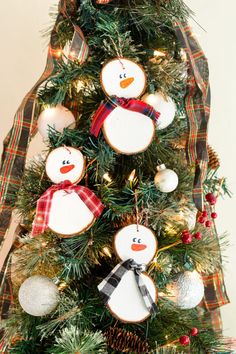 a decorated christmas tree with snowmen on it