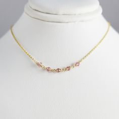 This dainty handmade necklace features 5 genuine Pink Tourmaline gemstones wrapped on a chain. This delicate choker necklace is beautiful worn alone or layered with other necklaces. A classic and simple everyday piece that will make fashion look effortless. Customize yours by choosing your metal and length. This necklace design is also available in different gemstones. Makes a great gift to add to any gemstone lover's collection. Perfect to gift for Christmas, Valentine's Day, Mother's Day, and Delicate Choker Necklace, Pink Tourmaline Necklace, Delicate Choker, Make Fashion, Necklace Design, Tourmaline Necklace, Tourmaline Gemstone, Faceted Gemstones, Handmade Necklace