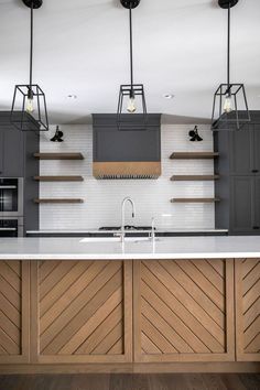 (paid link) Subtle accents in soothing shades, such as sage green tiles or off-black cabinetry, are other smart ways to give a white kitchen depth and ... Chevron Island, Warm Kitchen, Two Tone Kitchen, Industrial Kitchen, Wooden Cabinets, Kitchen Designs, Beautiful Kitchens