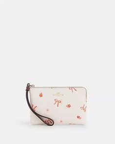 COACH® | Corner Zip Wristlet With Bow Print Coach Bow Print, Cute Wallet, Handbag Essentials, Bow Print, Cute Wallets, Girly Bags, Coach Outlet, Fancy Bags, Girly Accessories