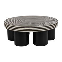 three black and white tables with circular designs