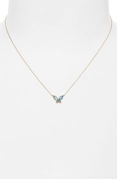 Ethereal blue topaz shimmers on the minimalist butterfly pendant at the heart of this delicate chain necklace handcrafted from 14-karat gold. 16" length; 2" extender   14k gold/topaz   Imported   Certified member of the Responsible Jewellery Council (RJC), which sets standards for supply chain integrity and sustainability throughout the global jewelry and watch industries Blue Butterfly Necklace, Minimalist Butterfly, Ethereal Blue, Bony Levy, Gold Topaz, Topaz Necklace, Dress Indian, Butterfly Pendant Necklace, Delicate Chain