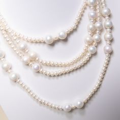 Our winter favorite necklace ever! 8-9mm round pearls combined with 3-4mm baby pearls are beaded into a French vintage style that matched so well with turtle neck or any other sweater or dress! It can be worn as 2-layer or 3 or 4 layers however you want. Pearl Type: Freshwater Pearls Pearl Quality: AA [Shape]: Round [Pearl Size]: 5-9mm [Blemish]: Minor [Luster]: High Necklace Length: 160cm Note: Every pearl is unique. Items may vary from the pictures. French Lady, Favorite Necklace, Long Rope, Baby Pearls, Freshwater Pearl Necklace, French Women, Pearl Types, Freshwater Pearl Necklaces, Silver Chain Necklace