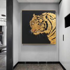 a large tiger painting hanging on the wall in a modern office space with marble flooring