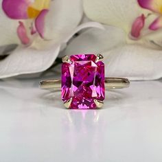 "The ring pictured is lab created sapphire #6419 Video shown in 14k white gold -Approximate total carat weight:  3.90ctw. diamond equivalent  -Center Stone Size:  10x8mm - approx. 3.90ct diamond equivalent  -Center Stone Shape: radiant cut  -Gem Type:  lab created pink sapphire -Stone Clarity: VS2 -Stone Color: pink -Moh's Scale: 9 hardness -Metal Type and Purity: 14k yellow gold -Setting: Claw Prong Brasket Head -Stock Ring Size: 6 -Country of Manufacturing:  USA (Michigan) For customization pl Sapphire Solitaire Engagement Ring, Sapphire Birthstone Ring, Pink Sapphire Engagement Ring, Pink Engagement, Pink Sapphire Ring Engagement, Sapphire Birthstone, Edwardian Jewelry, Shiny Objects, Sapphire Solitaire