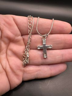 Unique vintage cross.  Great details!  Minor wear on finish. Metal Rhinestone Cross Pendant Necklace, Metal Cross Pendant Necklace With Rhinestones, Silver Cross Jewelry With Rhinestones, Metal Cross Pendant Necklace, Vintage Metal Crucifix Cross Necklace, Vintage Nickel-free Cross Necklace, Sterling Silver Cross Jewelry With Rhinestones, Spiritual Cross Pendant Necklace For Jewelry Making, Spiritual Metal Cross Necklace