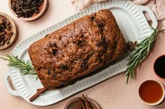 a loaf of bread sitting on top of a white plate