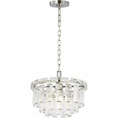 a crystal chandelier hanging from the ceiling