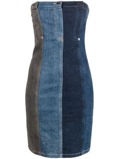 a women's denim dress with two different colors on the sides and one side