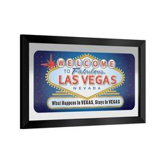 the welcome sign for las vegas nevada in front of a white wall with black frame