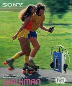 two girls rollerblading in the park with headphones and earbuds on