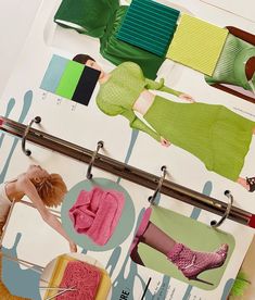 an assortment of clothing and accessories displayed on a magazine page, including clothes hangers