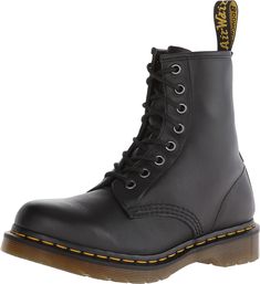 PRICES MAY VARY. Original Dr. Martens boot, built for a woman Made with all the classic Doc's DNA, including grooved sides, heel-loop and yellow stitching Built on the iconic Dr. Martens air-cushioned, with good abrasion and slip resistance Material Composition: Skin Music Festival Shoes, Women Boots Outfit, Alcohol En Gel, Dr Martens Womens, Festival Shoes, Mens Boots Fashion, Leather Lace Up Boots, Low Boots, Combat Boot