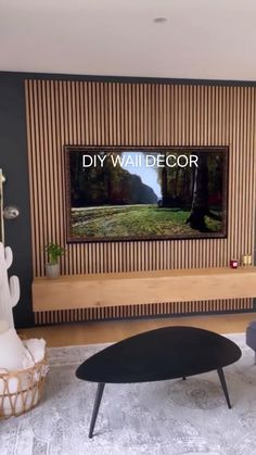 a man standing on top of a couch in a living room