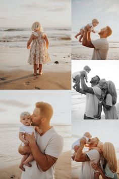 a man and woman holding a baby while standing on top of a beach next to the ocean