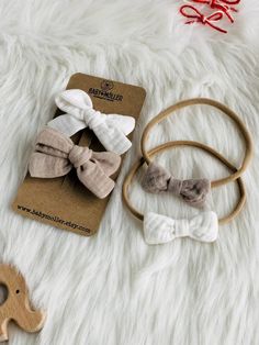 Introducing these Hand-tied Muslin Cotton Bows which you can use as pigtail bows, baptism headband bows, Christmas bows, and other special occasions.  Made with soft, stretchy nylon headbands or detachable alligator clip.  They're gentle on delicate skin and designed for maximum comfort. 🪡 MATERIALS: - Our bows are handmade from Organic Muslin - 100 % Nylon (soft and very stretchy) / Alligator Clip (detachable) ⏱️PROCESSING TIME and SHIPPING: - Our current processing time is: 1-3 business days Adjustable Cream Hair Accessories With Bow, Cute Cotton Hair Accessories For Gifts, White Bow With Matching Headband, White Cotton Hair Accessories For Gifts, White Bow Tie Headband, White Headband With Bow Tie, White Cotton Hair Accessories For Gift, White Cotton Hair Accessories As Gift, Adjustable White Bow With Matching Headband