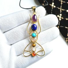 Note : You may have to pay the taxes to release your order from customs. Please ensure this before placing the order. . . **Handmade in India **Beautiful 7 chakra stone necklace suitable for all occasion, energetic necklace  **7 Chakra Necklace  **Available in Brass **Metal you can choose in options **Dimentions of 7 chakra  :    Length 8cm / 80mm    Approx. Note : This picture is taken naturally in day light no artificial lights used. picture color may varies durle to your screen resolutions settings. Multicolor Spiritual Jewelry With Stone Setting, Spiritual Round Pendant Necklace With Stone Setting, Spiritual Stone Setting Necklaces For Gifts, Spiritual Pendant Necklace With Stone Setting, Necklace Stone, Chakra Necklace, Chakra Jewelry, 7 Chakra, 7 Chakras