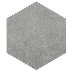 a cement hexagonal object on a white background that looks like it is made out of concrete