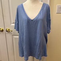 Purchased This Summer In The South Of France And Never Worn. Deep V-Neck, Short Sleeves, Drop Shoulder In A Soft, Slightly Nubby Linen Knit. Sky Blue. Tag Is Marked M/L, But This Shirt Is Oversized And Fits More Like A L/Xl. Measures 25 Inches P2p And Roughly 26.5 Inches In Length. Oversized V-neck T-shirt For Spring, Blue V-neck Top For Everyday Wear, Relaxed V-neck T-shirt For Spring, Blue V-neck Top For Everyday, Spring Oversized V-neck T-shirt, Casual V-neck Short Sleeve Top For Loungewear, Oversized V-neck Top In Solid Color, Washed Blue Oversized Short Sleeve Top, Blue V-neck T-shirt For Loungewear