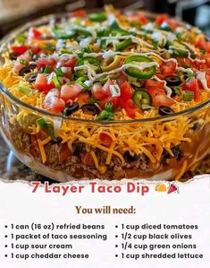 a taco dip recipe in a glass dish on a counter with instructions for how to make it